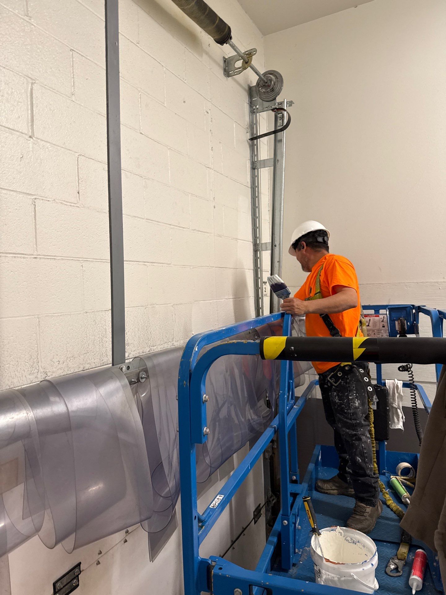 CTX painter working from a lift at Walmart Store 2808 in Midlothian, Virginia