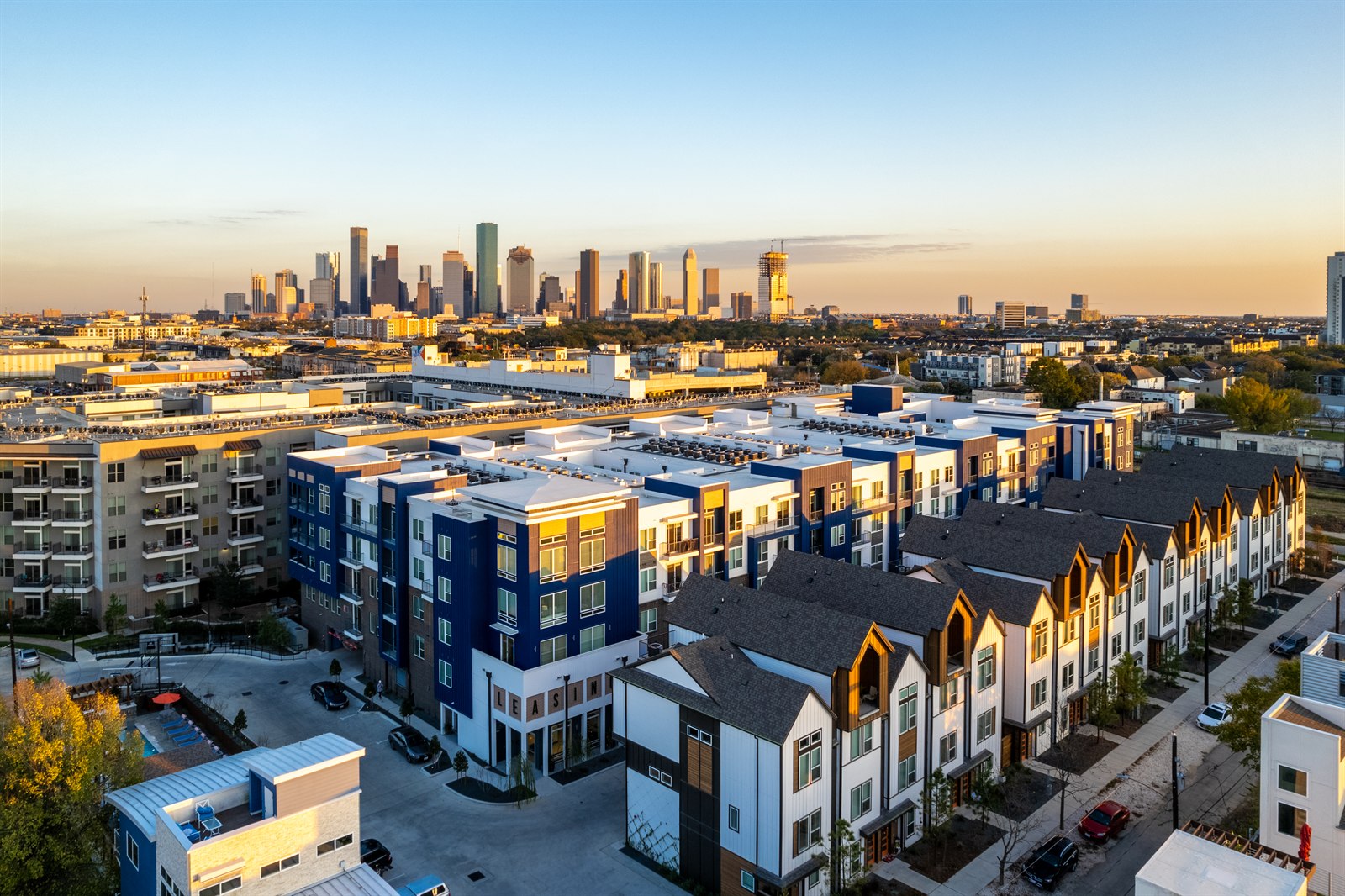 COOP Summer Street community with the Houston skyline
