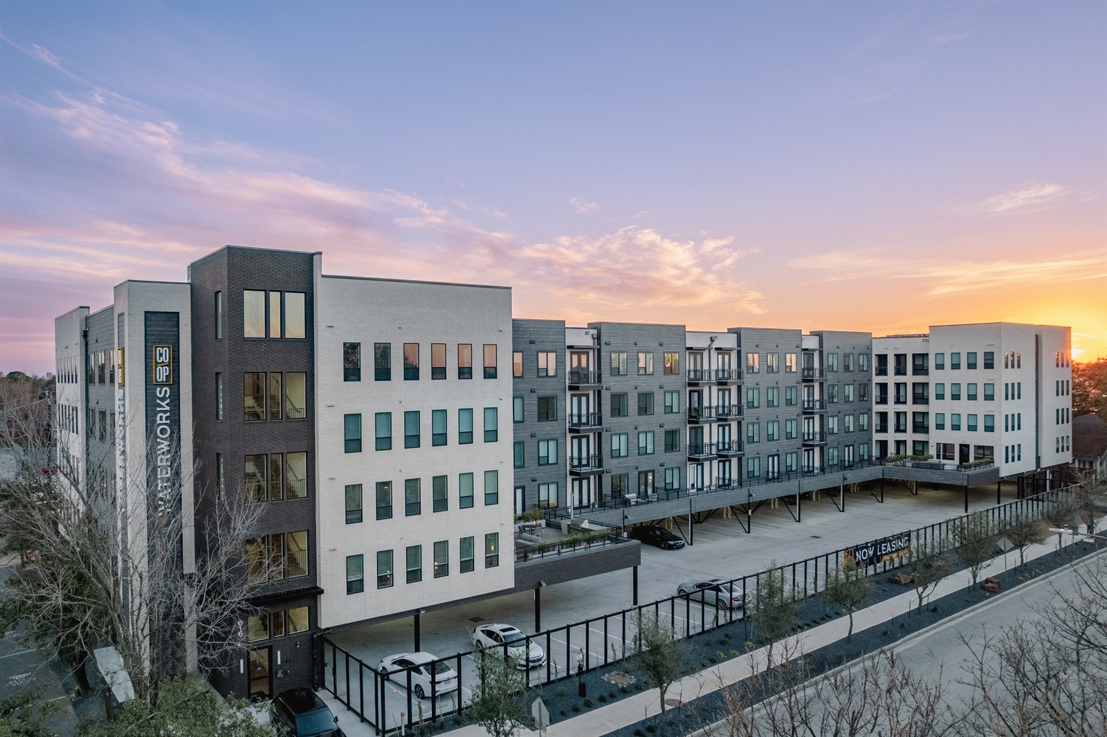 Waterworks I multifamily community at sunset